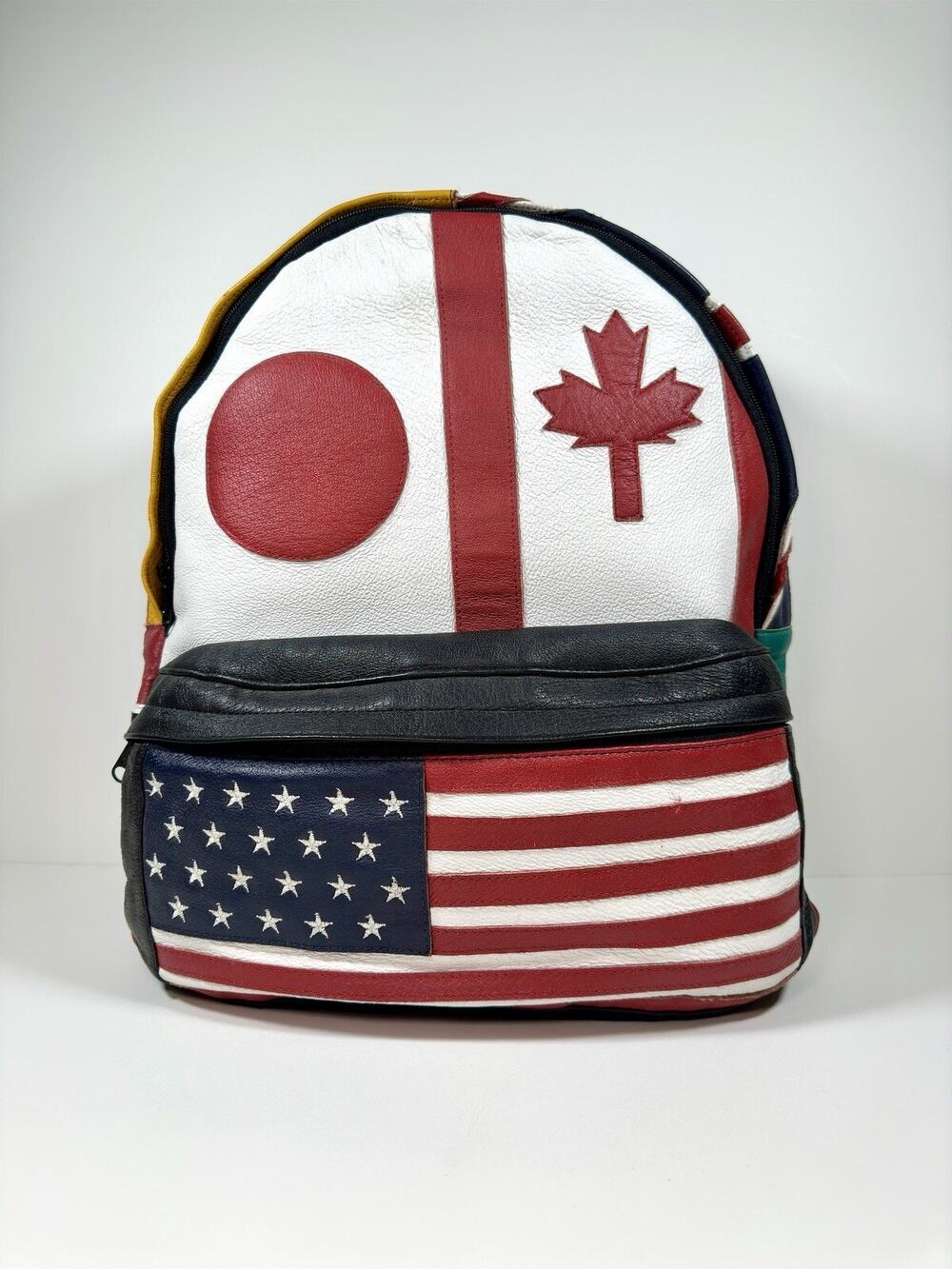 VTG Wilson’s Leather Backpack Retro Patchwork Bag Flag 90’s USA UK Canada JAPAN